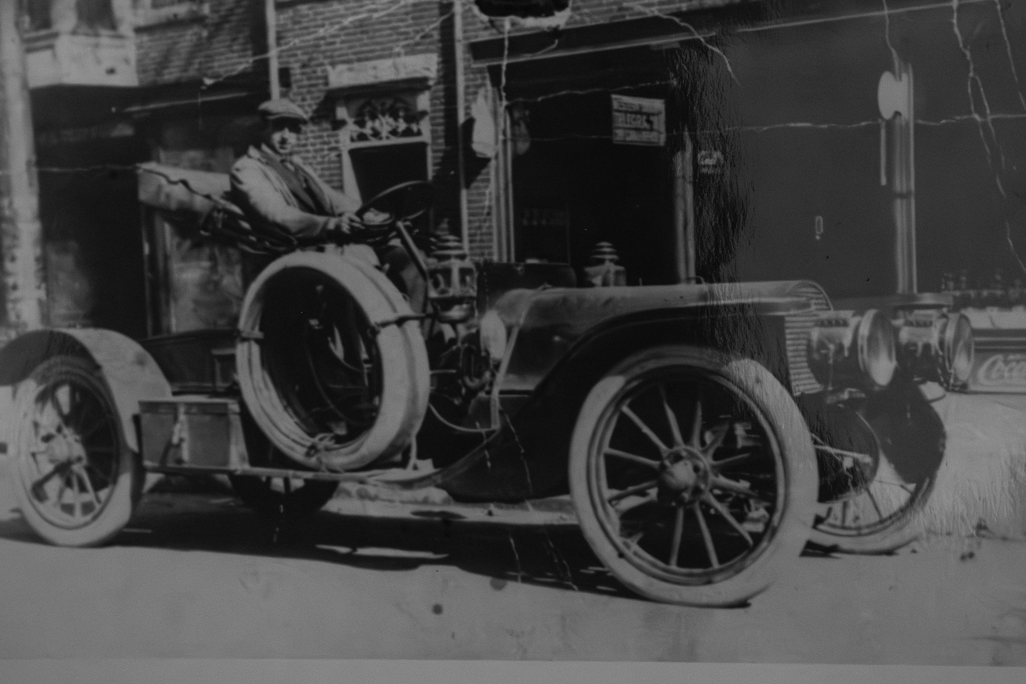 Foss Etheridge driving a 1933 Ford model car for Foss Etheridge Oil, a foundational legacy of Colby & Gale’s fuel service in Damariscotta and Lincoln County, Maine.