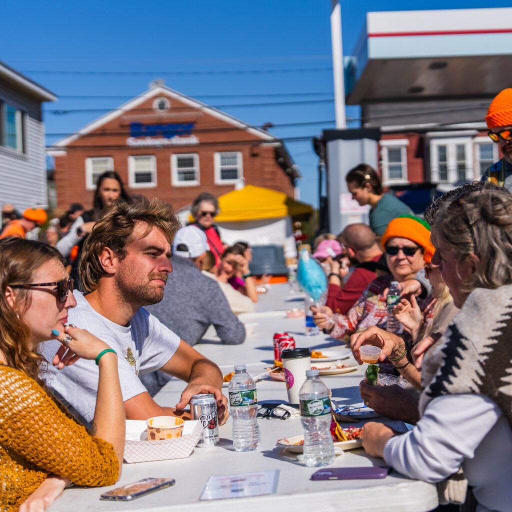 people eating at table for Damariscotta Pumpkinfest