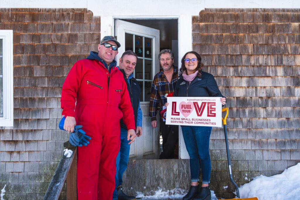 Group photo posing for fuel your love campaign complimentary fuel delivery. 