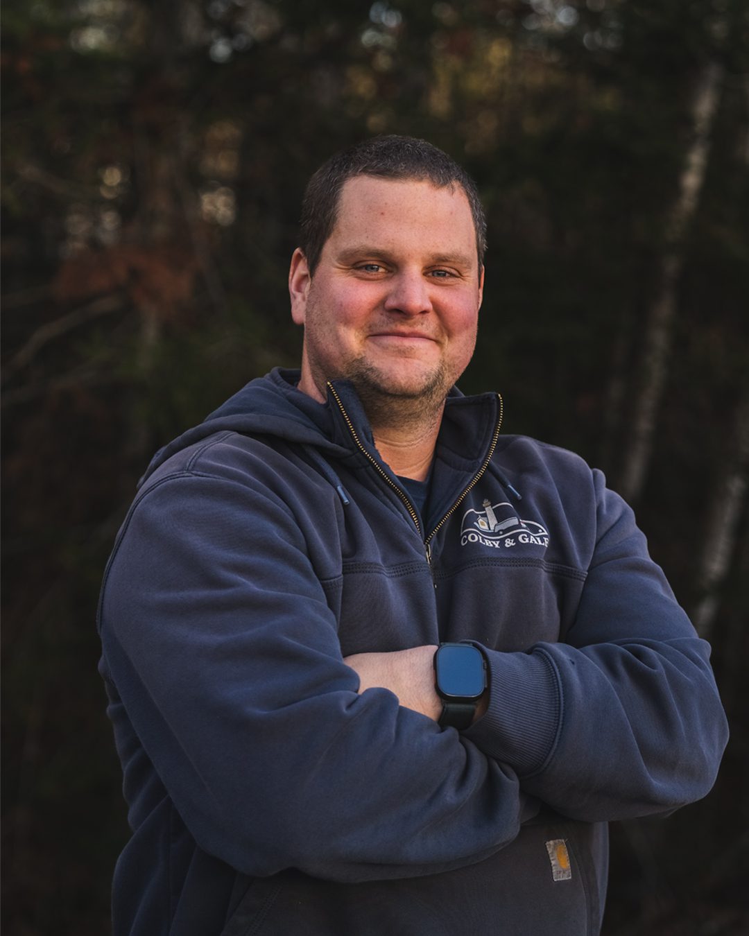 Nick Greenleaf with arms crossed and smiling.