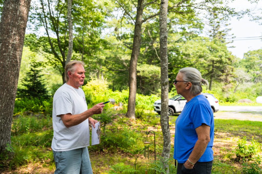 Shawn leeman a Colby & Gale energy advisor talking with a customer 